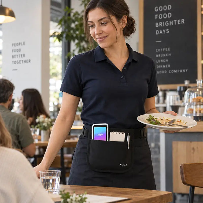 Restaurant server wearing Agoz apron pouch with Stripe Reader S700/S710 during tableside service