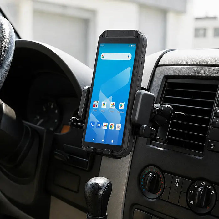 Almex handheld computer secured in an air vent cradle mount inside a work vehicle