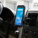 Almex handheld computer secured in an air vent cradle mount inside a work vehicle