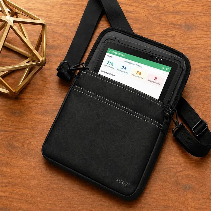 Black AgozTech tablet carrying case with shoulder strap displayed on a wood tabletop with a JLT tablet inside.