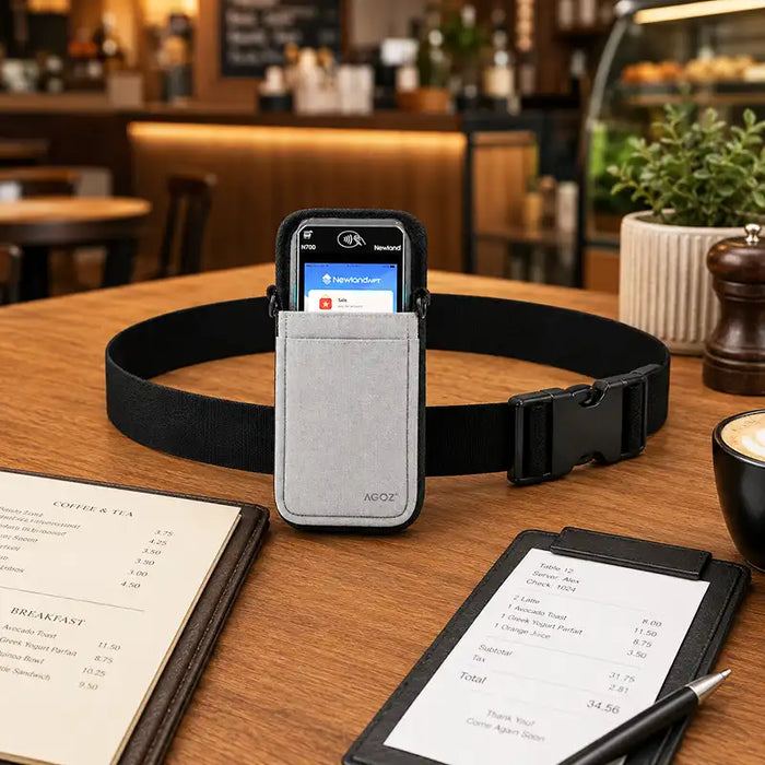 AgozTech gray Newland POS waist belt holster displayed on a hospitality table with receipt and menu accessories.