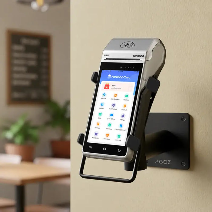 Newland payment terminal secured in an AgozTech adjustable swivel and tilt wall mount at a restaurant payment station.