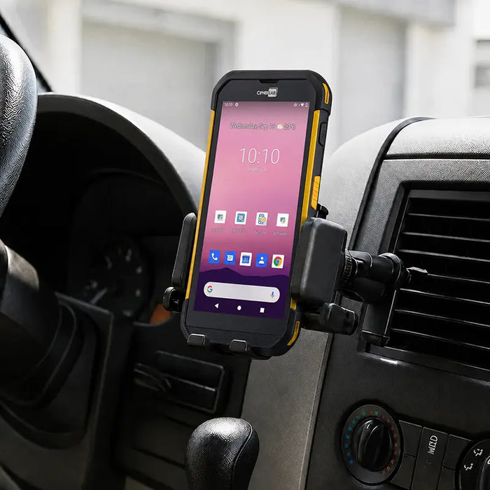 Cipherlab mobile scanner secured in an AgozTech air vent cradle mount inside a commercial vehicle dashboard.