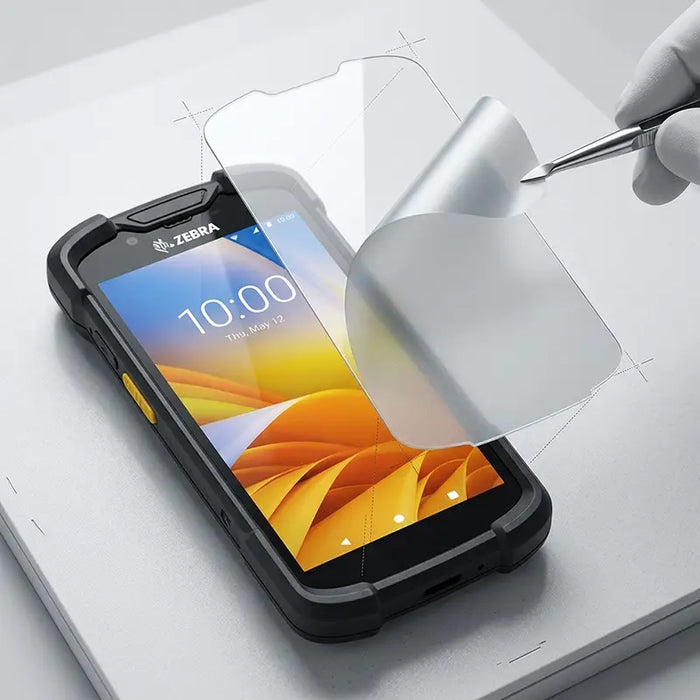 Tempered glass screen protector being aligned and applied to Zebra TC73 / TC78 mobile computer screen