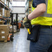 Warehouse worker reaching for Zebra TC58 scanner with trigger handle in AgozTech holster case