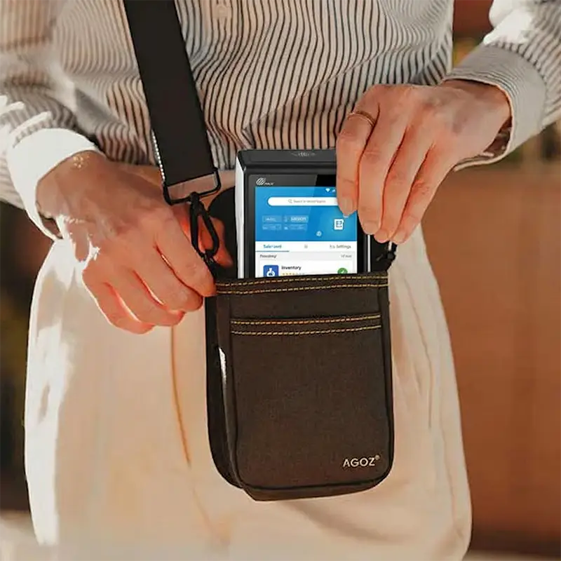 Person placing PAX A800 payment terminal into AgozTech black shoulder case