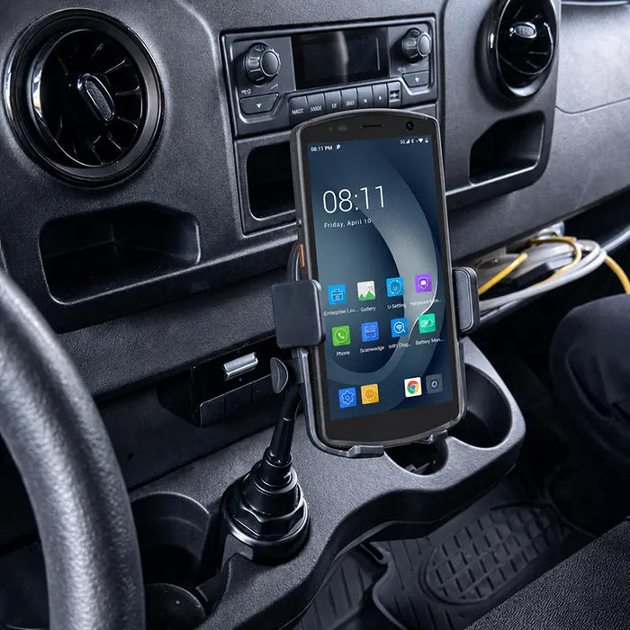 Urovo mobile computer secured in a cup holder vehicle cradle mount inside a commercial vehicle console.